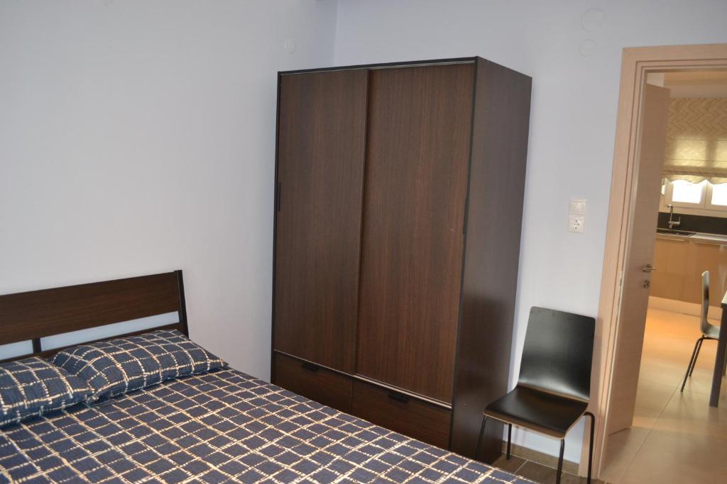Łóżko lub łóżka w pokoju w obiekcie Kalamaria brand new 1 bedroom apartment