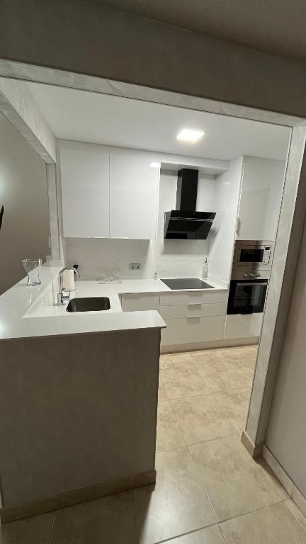 Kuchyňa alebo kuchynka v ubytovaní Apartamento Al-Alba Golf Resort Valle del Este Vera