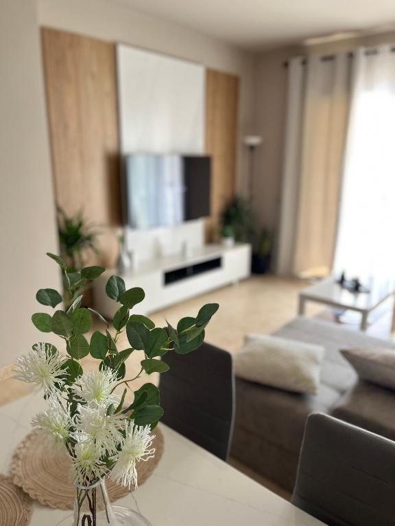 Posteľ alebo postele v izbe v ubytovaní Apartamento Al-Alba Golf Resort Valle del Este Vera