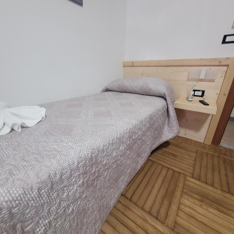Postel nebo postele na pokoji v ubytování Chalet Monte Nebius