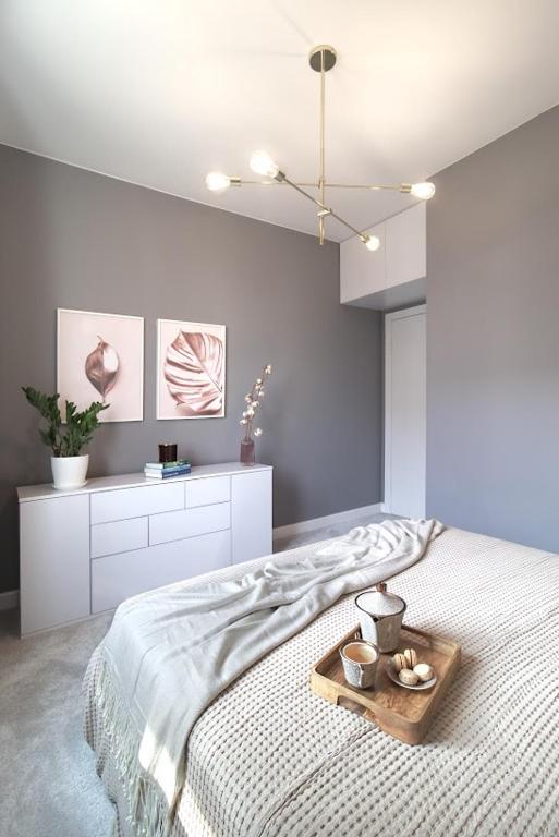 Posteľ alebo postele v izbe v ubytovaní Apartament Topo - Puck, ulica Nowy Swiat 23C