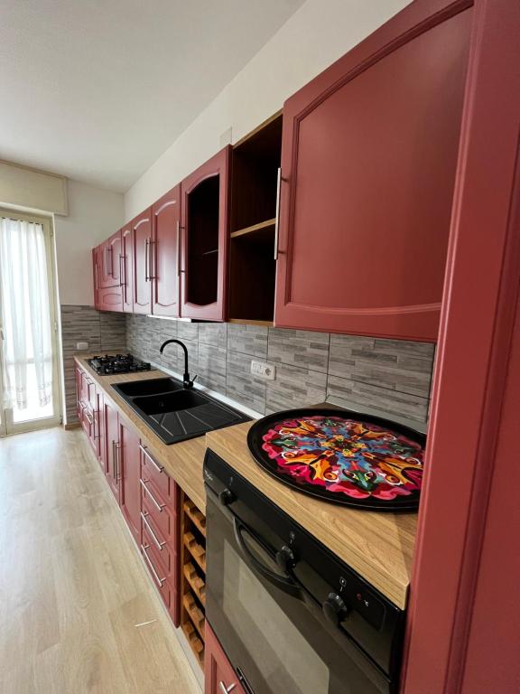 A kitchen or kitchenette at Renovated Loft with Vesuvio view terrace