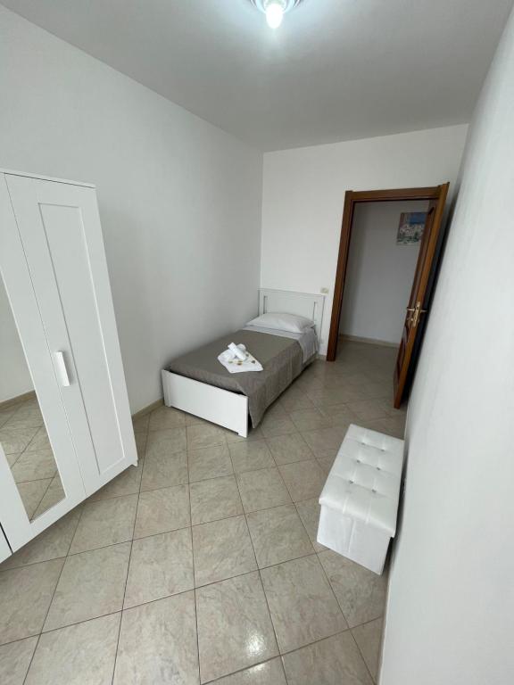 Postel nebo postele na pokoji v ubytování FlorAngè guest house