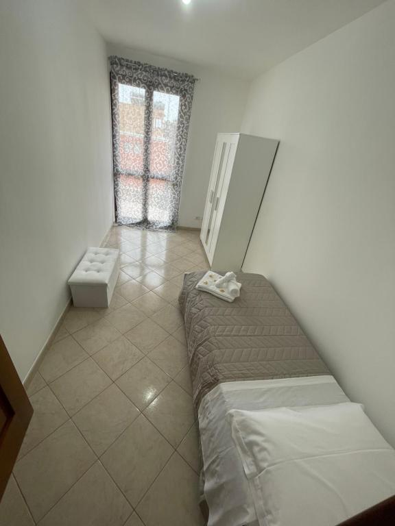 Postel nebo postele na pokoji v ubytování FlorAngè guest house