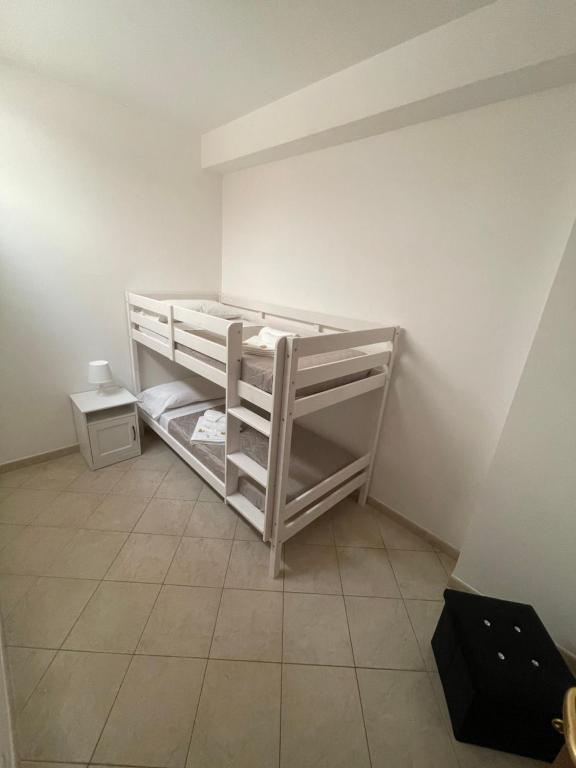 Postel nebo postele na pokoji v ubytování FlorAngè guest house