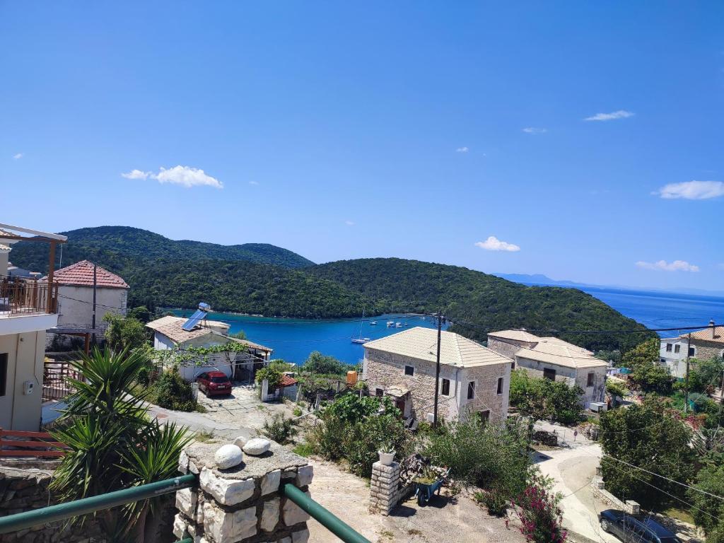 a view of a town with a body of water at sivotahomes-Amaya in Syvota