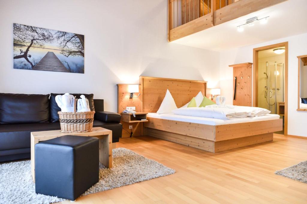 Postel nebo postele na pokoji v ubytování Burg Hotel Feldberg