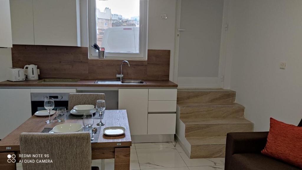 Kuchyň nebo kuchyňský kout v ubytování 10 Msida Park Residence