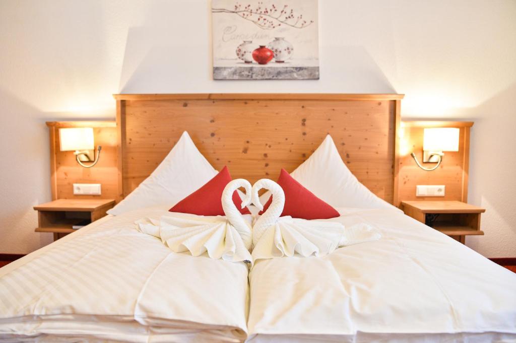 Postel nebo postele na pokoji v ubytování Burg Hotel Feldberg
