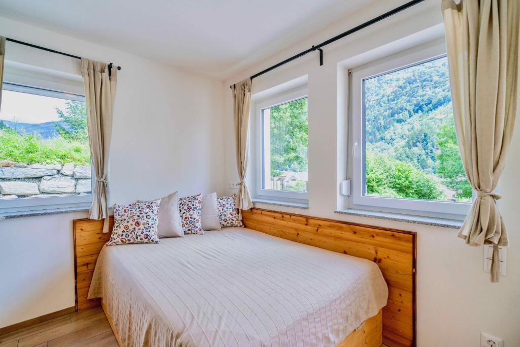 Postel nebo postele na pokoji v ubytování 3Traumhaftes Ferienhaus in bester Lage