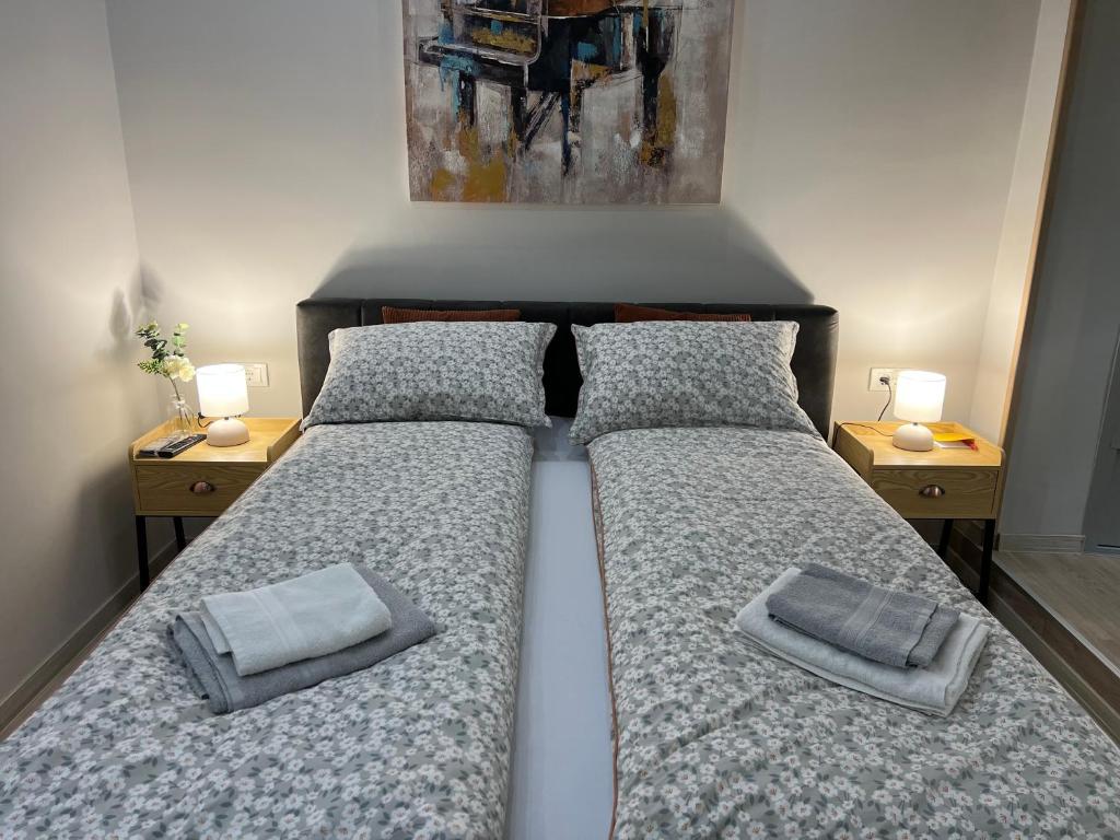 En eller flere senger på et rom på Apartman Time out 1