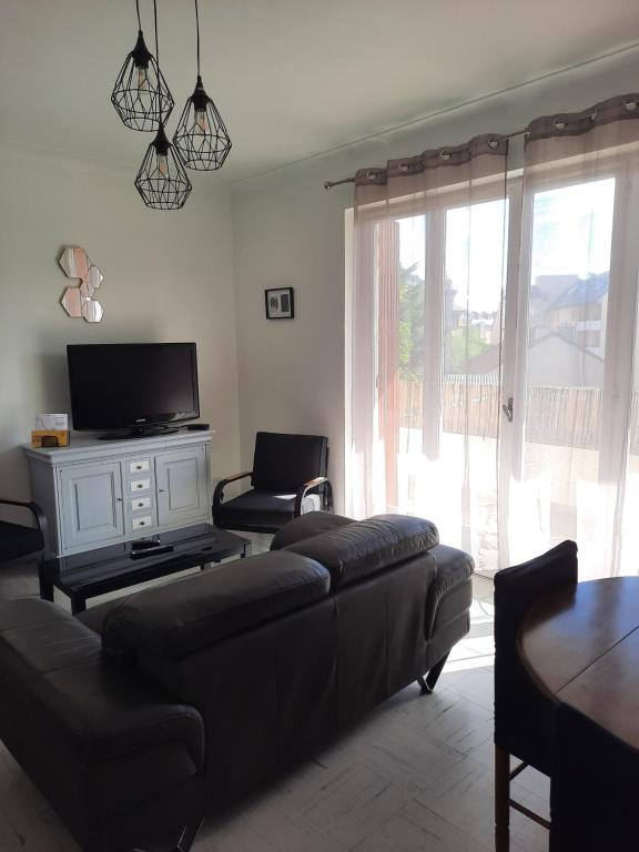 Televízia a/alebo spoločenská miestnosť v ubytovaní Ruthen'Stay 1 bedroom Apartment