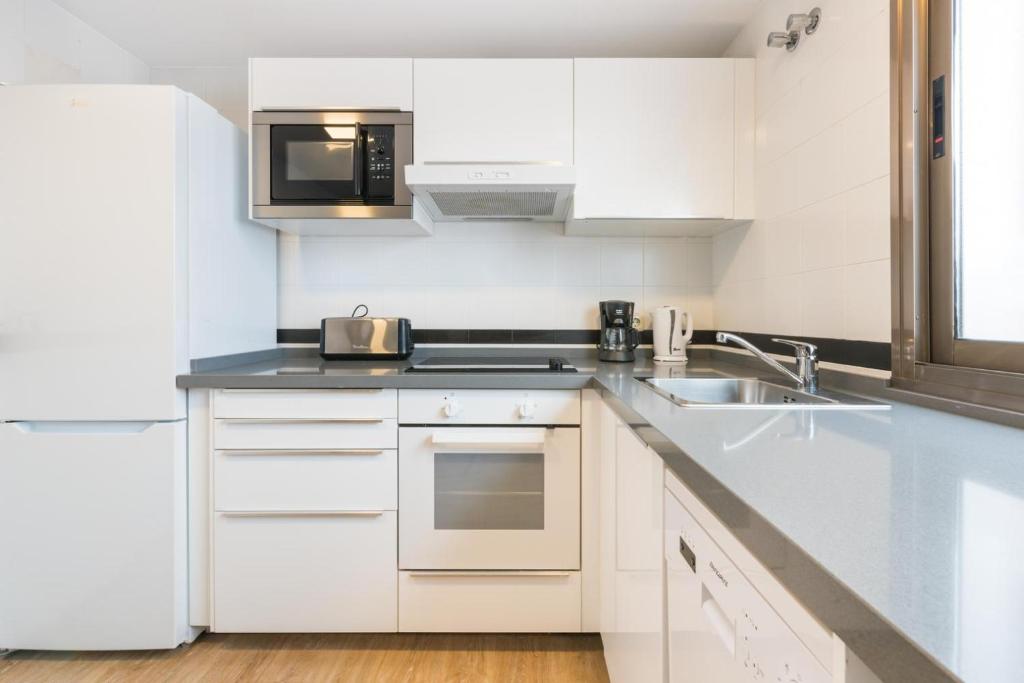 Kuchyňa alebo kuchynka v ubytovaní APARTAMENTO MODERNO CALLE LARIOS