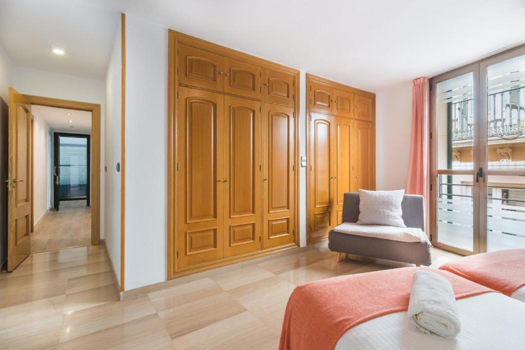 Posteľ alebo postele v izbe v ubytovaní APARTAMENTO MODERNO CALLE LARIOS