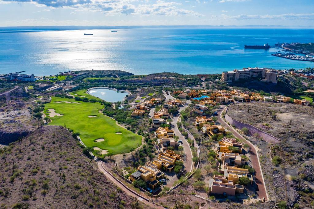 an aerial view of a resort near the ocean at Puerta Cortes Residences in La Paz