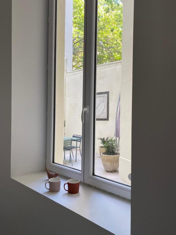 &Uuml;ldine vaade majutusasutusest Appartement c&oelig;ur de Nimes avec cour