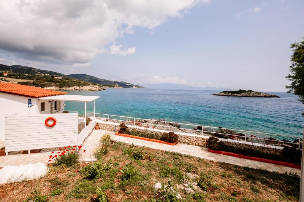 a house with a view of the ocean at Floreica Studio By The Sea in Skinária