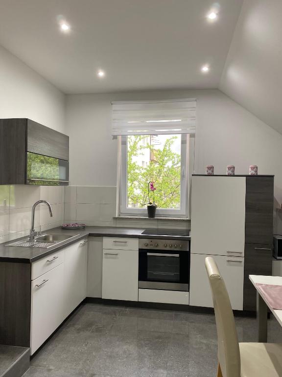 Kuchyň nebo kuchyňský kout v ubytování Apartma Azurre