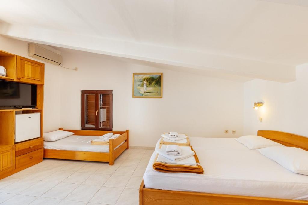 Postel nebo postele na pokoji v ubytování Radic Rooms