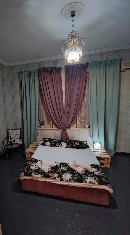 Llit o llits en una habitació de Friendly Guest House