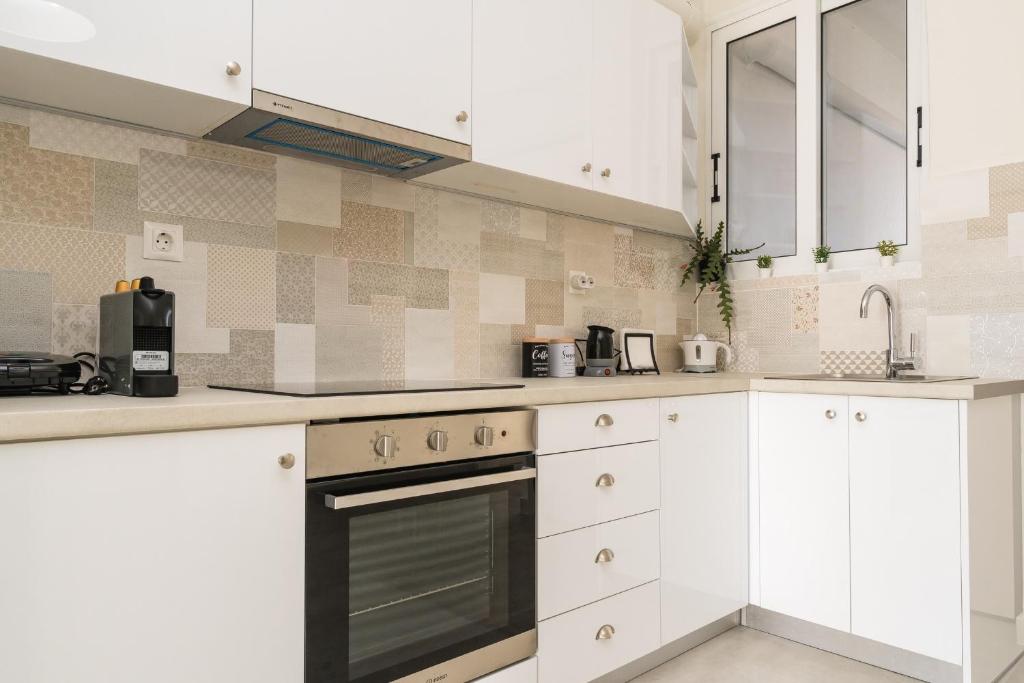 Kuchyň nebo kuchyňský kout v ubytování Sissy apartment
