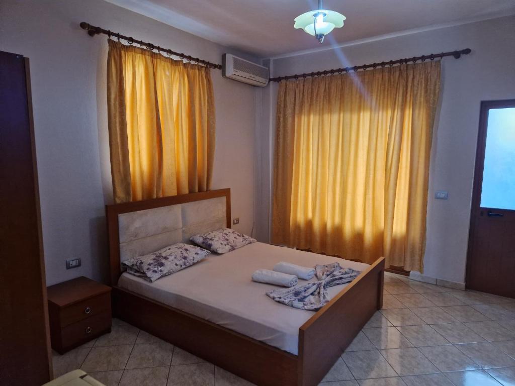 Postel nebo postele na pokoji v ubytování Guest House "Pisha"