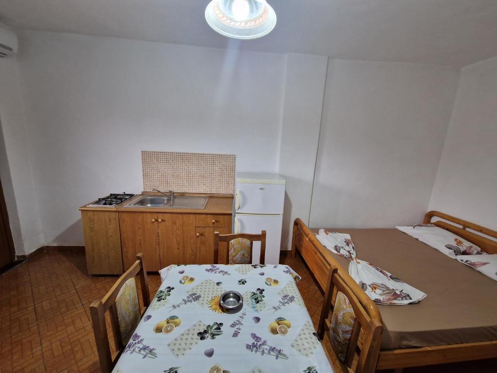 Postel nebo postele na pokoji v ubytování Guest House "Pisha"