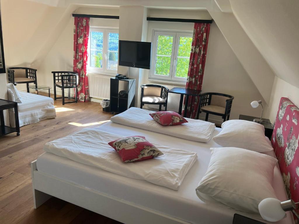 Postel nebo postele na pokoji v ubytování Landhaus Strussnighof