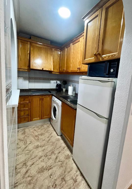 Kuchyňa alebo kuchynka v ubytovaní P.S. Apartment