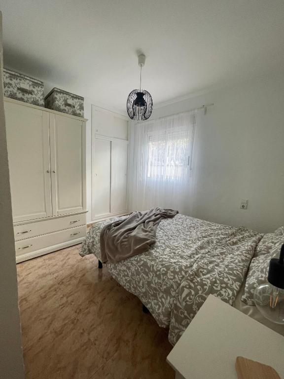 Posteľ alebo postele v izbe v ubytovaní P.S. Apartment