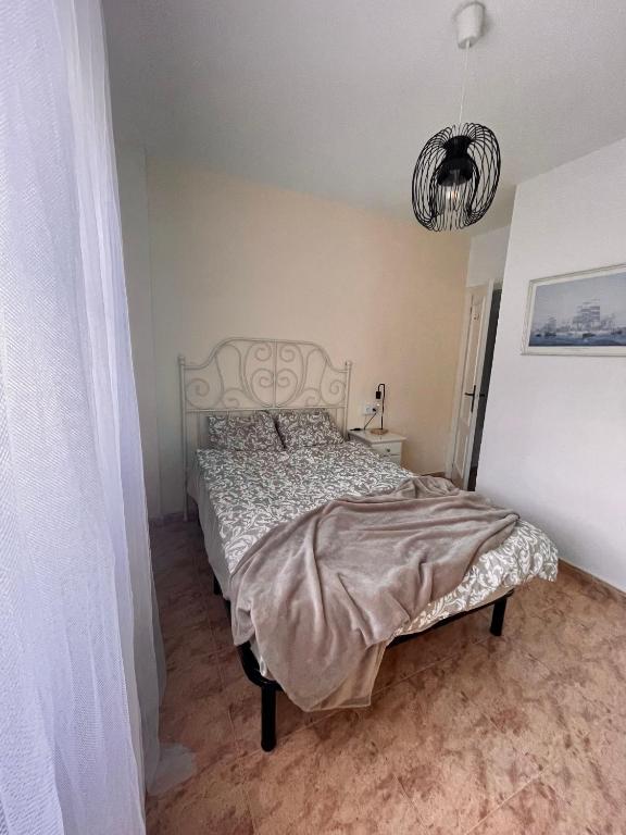 Posteľ alebo postele v izbe v ubytovaní P.S. Apartment