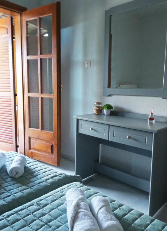 Postel nebo postele na pokoji v ubytování Iris House