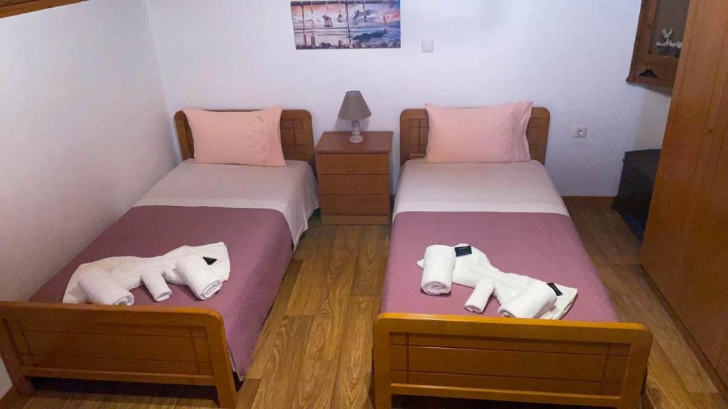 Posteľ alebo postele v izbe v ubytovaní Symi Breeze villa