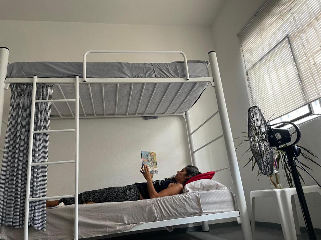 Postel nebo postele na pokoji v ubytování Vive Alegria Hostel