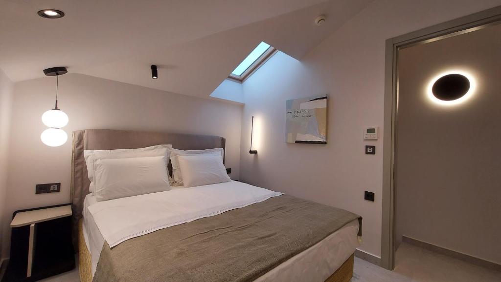 Postel nebo postele na pokoji v ubytování Kynara Elegant Living
