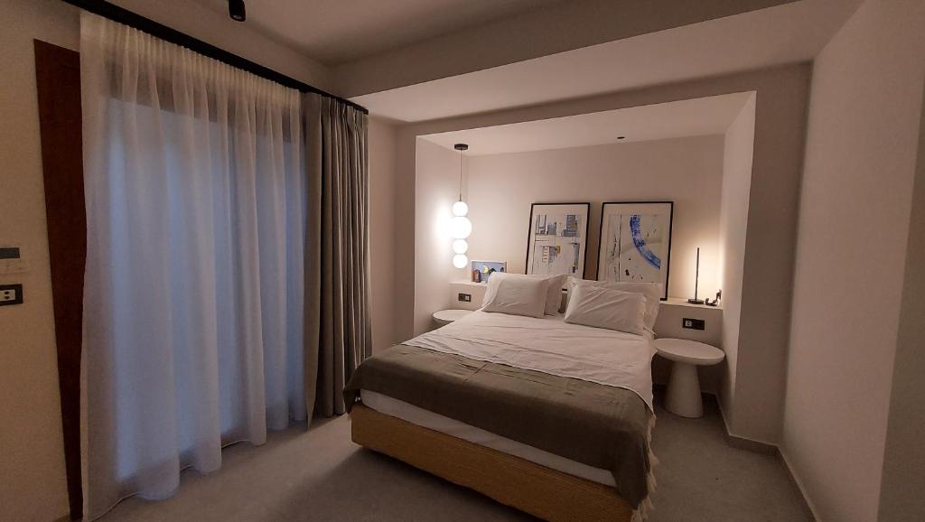 Postel nebo postele na pokoji v ubytování Kynara Elegant Living