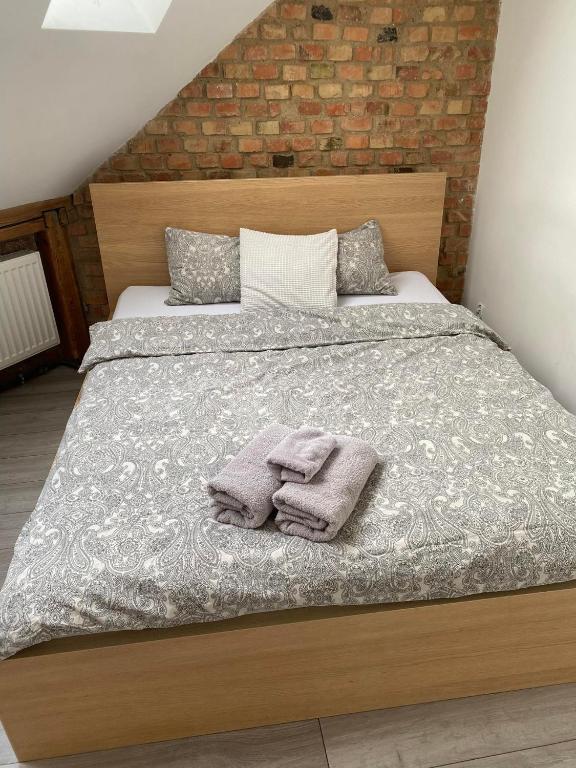 Posteľ alebo postele v izbe v ubytovaní Secret Apartament 2 Poznań