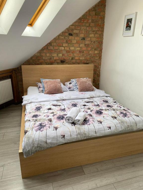 Posteľ alebo postele v izbe v ubytovaní Secret Apartament 2 Poznań