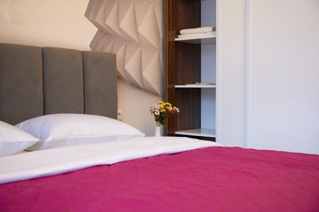 Postel nebo postele na pokoji v ubytování HOTEL LORD