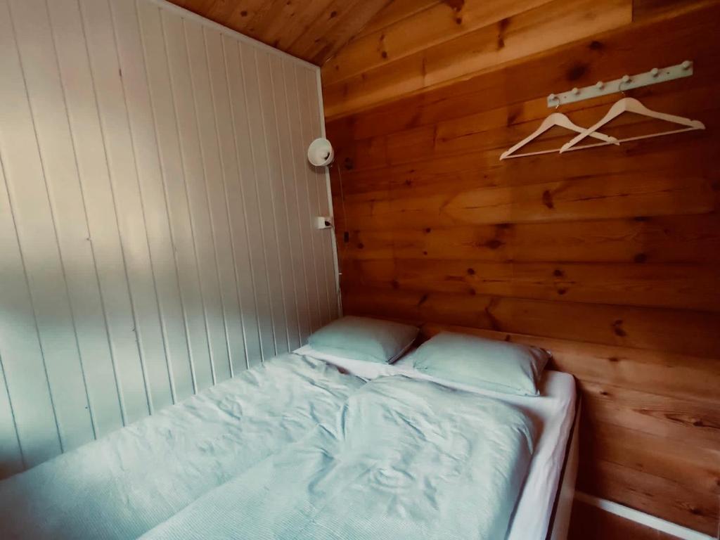 Postel nebo postele na pokoji v ubytování Chalet im Gus - Flumserberge & Walensee