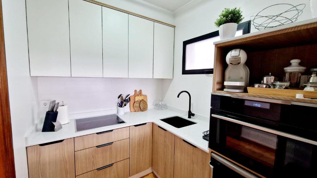 A kitchen or kitchenette at Apartamento CARBALLEIRA