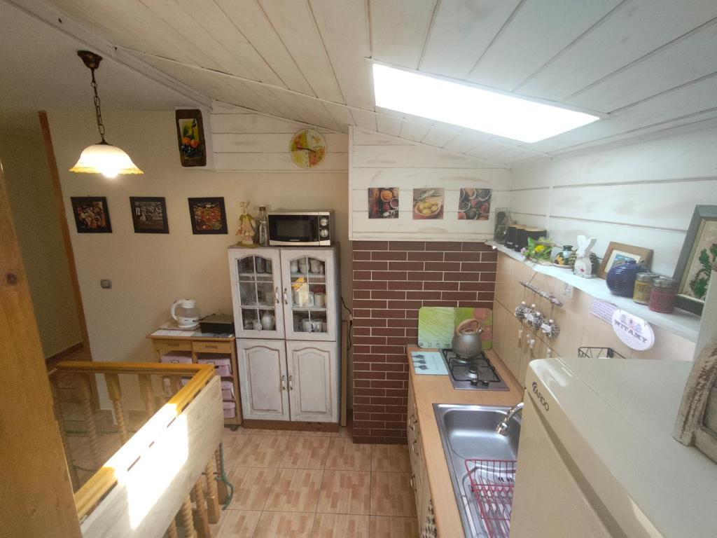 Kuchyň nebo kuchyňský kout v ubytování Pokoje Gościnne "Justyna" - Podlesice 34