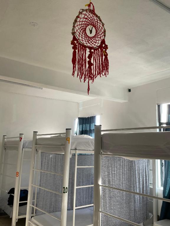 Postel nebo postele na pokoji v ubytování Vive Alegria Hostel