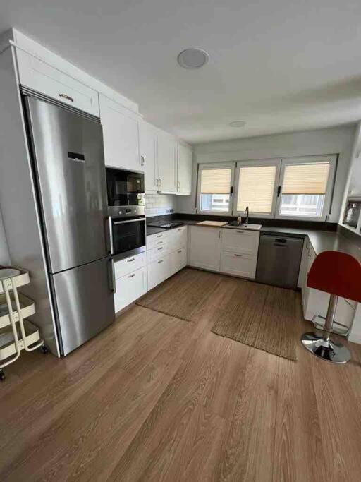 Kuchyň nebo kuchyňský kout v ubytování Precioso apartamento recién reformado