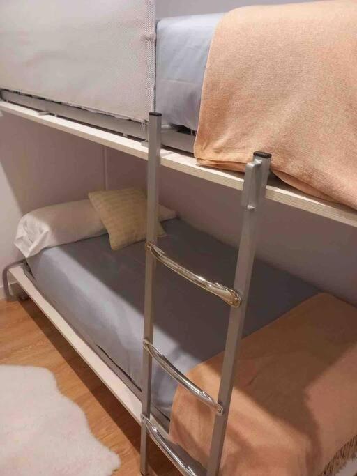 Postel nebo postele na pokoji v ubytování Precioso apartamento recién reformado