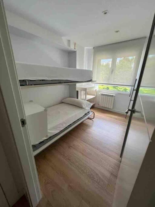 Postel nebo postele na pokoji v ubytování Precioso apartamento recién reformado