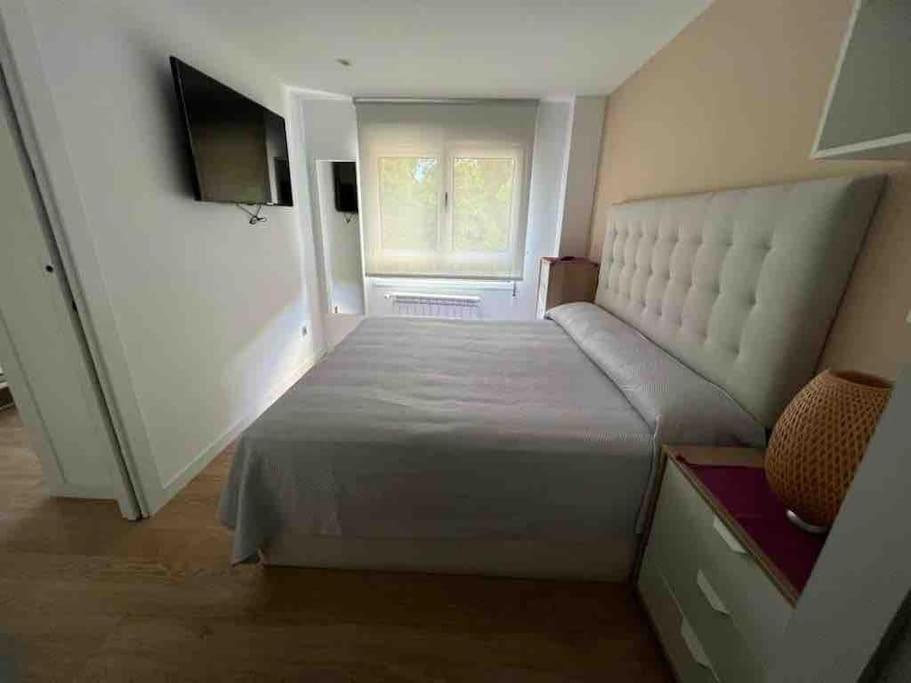 Postel nebo postele na pokoji v ubytování Precioso apartamento recién reformado