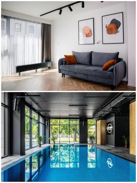 a living room and a swimming pool in a house at SMART Apartament BASEN & SPA UNIA ART RESIDENCE Centrum, garaż free,faktura VAT in Lublin