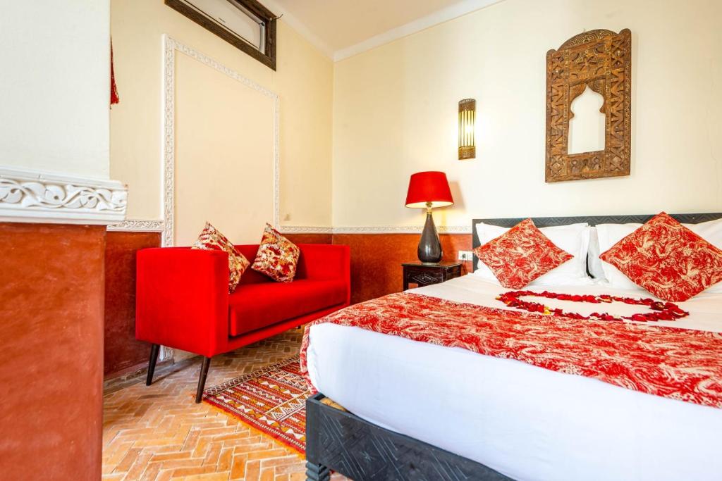 Postel nebo postele na pokoji v ubytování Riad L'orange Bleue