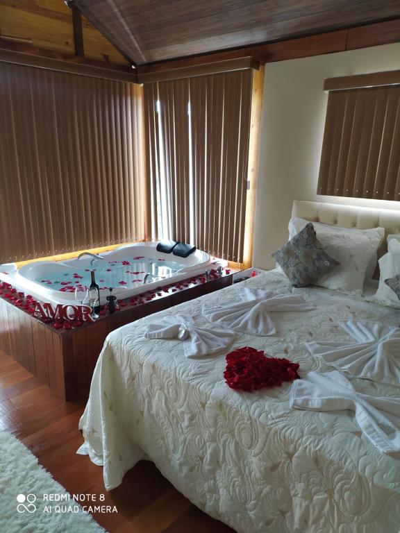Ein Bett oder Betten in einem Zimmer der Unterkunft Pousada Irmãos Tonoli